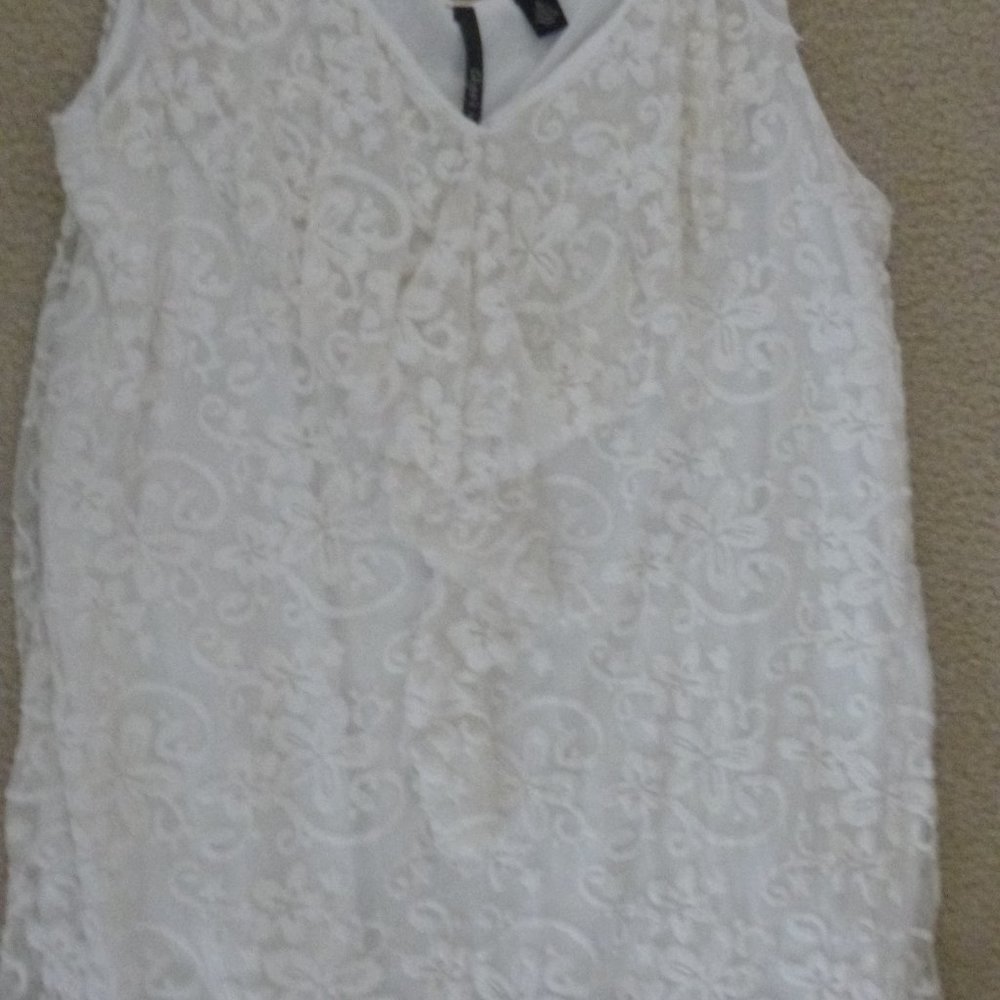 Women's sleeveless white blouse